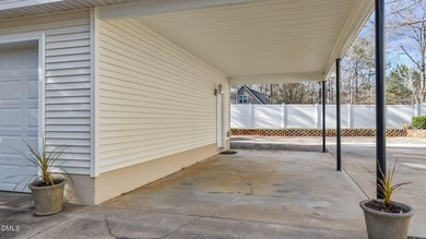 Welcome to lake living in this charming Ranch home located in a on River Golf and Country Club at Lake Royale in North Carolina - for sale on GolfHomes.com, golf home, golf lot