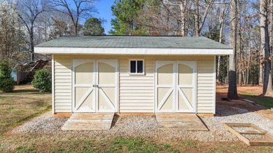 Welcome to lake living in this charming Ranch home located in a on River Golf and Country Club at Lake Royale in North Carolina - for sale on GolfHomes.com, golf home, golf lot
