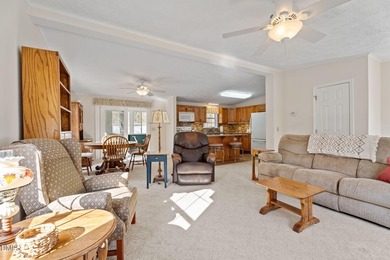 Welcome to lake living in this charming Ranch home located in a on River Golf and Country Club at Lake Royale in North Carolina - for sale on GolfHomes.com, golf home, golf lot