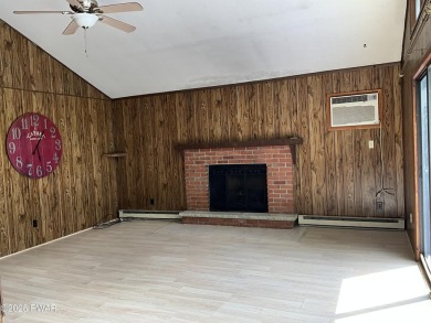 Fall in love with this sweet, simple, and affordable getaway in on The Hideout Golf in Pennsylvania - for sale on GolfHomes.com, golf home, golf lot