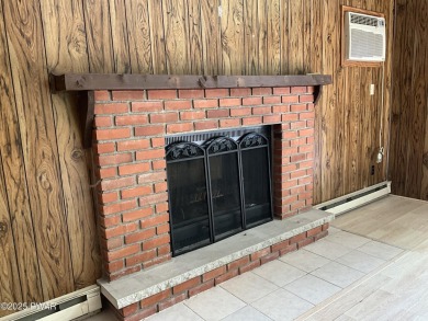 Fall in love with this sweet, simple, and affordable getaway in on The Hideout Golf in Pennsylvania - for sale on GolfHomes.com, golf home, golf lot