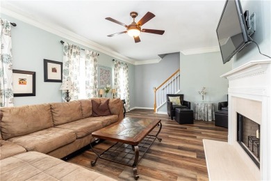 Welcome to this beautifully maintained three-level end-unit on Sugar Hill Golf Club in Georgia - for sale on GolfHomes.com, golf home, golf lot
