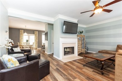 Welcome to this beautifully maintained three-level end-unit on Sugar Hill Golf Club in Georgia - for sale on GolfHomes.com, golf home, golf lot