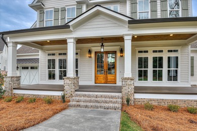 Tucked away on a 3/4-acre cul-de-sac lot in the highly on West Lake Country Club in Georgia - for sale on GolfHomes.com, golf home, golf lot