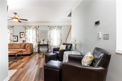 Welcome to this beautifully maintained three-level end-unit on Sugar Hill Golf Club in Georgia - for sale on GolfHomes.com, golf home, golf lot