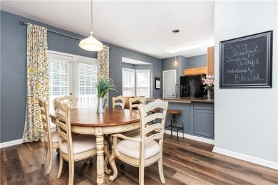 Welcome to this beautifully maintained three-level end-unit on Sugar Hill Golf Club in Georgia - for sale on GolfHomes.com, golf home, golf lot