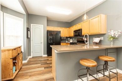Welcome to this beautifully maintained three-level end-unit on Sugar Hill Golf Club in Georgia - for sale on GolfHomes.com, golf home, golf lot