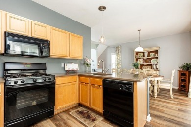 Welcome to this beautifully maintained three-level end-unit on Sugar Hill Golf Club in Georgia - for sale on GolfHomes.com, golf home, golf lot