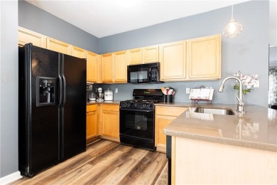 Welcome to this beautifully maintained three-level end-unit on Sugar Hill Golf Club in Georgia - for sale on GolfHomes.com, golf home, golf lot