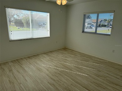 Upgraded 2/2 Palm Golf Course Home Located in Eagle Ridge home on Eagle Ridge At Spruce Creek Country Club in Florida - for sale on GolfHomes.com, golf home, golf lot