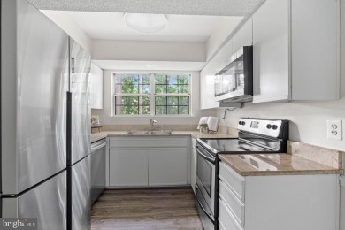 Welcome to 12023 Golf Ridge Court, Unit 201 - a beautifully on Penderbrook Golf Club in Virginia - for sale on GolfHomes.com, golf home, golf lot