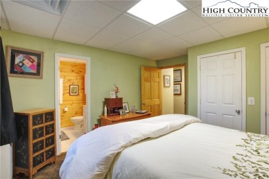Sunset views, solar power, and space for everyone--this on Mountain Aire Golf Course in North Carolina - for sale on GolfHomes.com, golf home, golf lot