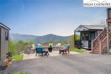 Sunset views, solar power, and space for everyone--this on Mountain Aire Golf Course in North Carolina - for sale on GolfHomes.com, golf home, golf lot