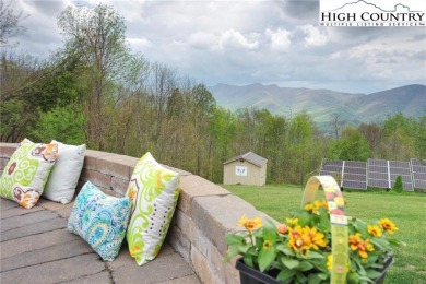 Sunset views, solar power, and space for everyone--this on Mountain Aire Golf Course in North Carolina - for sale on GolfHomes.com, golf home, golf lot