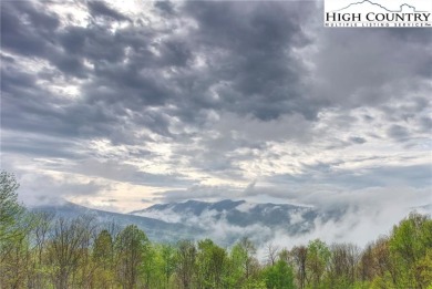Sunset views, solar power, and space for everyone--this on Mountain Aire Golf Course in North Carolina - for sale on GolfHomes.com, golf home, golf lot