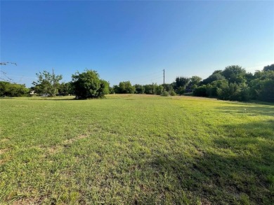 Love playing golf? Love the lake? Or both? Then this lot is for on The Club At Runaway Bay in Texas - for sale on GolfHomes.com, golf home, golf lot
