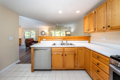 Privacy abounds in this move-in ready Nantucket style condo at on The Golf Club At Southport in Massachusetts - for sale on GolfHomes.com, golf home, golf lot