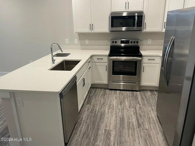 OWN YOUR PLACE AT THE BEACH-Rare Third Floor Opportunity! on Crow Creek Golf Club in North Carolina - for sale on GolfHomes.com, golf home, golf lot