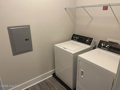 OWN YOUR PLACE AT THE BEACH-Rare Third Floor Opportunity! on Crow Creek Golf Club in North Carolina - for sale on GolfHomes.com, golf home, golf lot