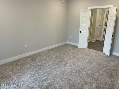 OWN YOUR PLACE AT THE BEACH-Rare Third Floor Opportunity! on Crow Creek Golf Club in North Carolina - for sale on GolfHomes.com, golf home, golf lot