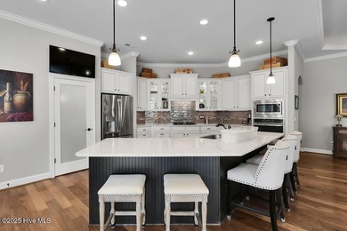 A stunning house built by Kent Homes with too many upgrades to on Cape Fear National At Brunswick Forest in North Carolina - for sale on GolfHomes.com, golf home, golf lot