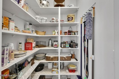 A stunning house built by Kent Homes with too many upgrades to on Cape Fear National At Brunswick Forest in North Carolina - for sale on GolfHomes.com, golf home, golf lot