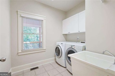 Welcome to 216 Brisbane Drive, a timeless Jeremy Rutenberg home on Bentwater Golf Club in Georgia - for sale on GolfHomes.com, golf home, golf lot