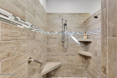 A stunning house built by Kent Homes with too many upgrades to on Cape Fear National At Brunswick Forest in North Carolina - for sale on GolfHomes.com, golf home, golf lot