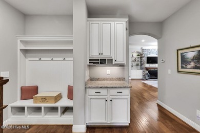 A stunning house built by Kent Homes with too many upgrades to on Cape Fear National At Brunswick Forest in North Carolina - for sale on GolfHomes.com, golf home, golf lot