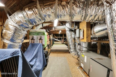 A stunning house built by Kent Homes with too many upgrades to on Cape Fear National At Brunswick Forest in North Carolina - for sale on GolfHomes.com, golf home, golf lot