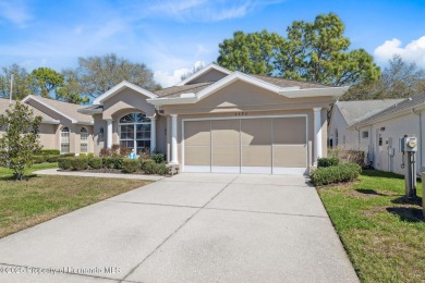 Welcome to your dream home nestled in the prestigious gated on Silverthorn Country Club in Florida - for sale on GolfHomes.com, golf home, golf lot