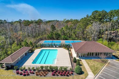 Step into luxury at Motts Village, one of Wilmington's most on Beau Rivage Golf and Resort in North Carolina - for sale on GolfHomes.com, golf home, golf lot