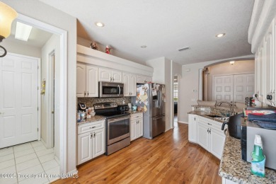 Welcome to your dream home nestled in the prestigious gated on Silverthorn Country Club in Florida - for sale on GolfHomes.com, golf home, golf lot