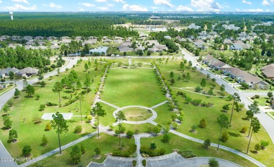 A stunning house built by Kent Homes with too many upgrades to on Cape Fear National At Brunswick Forest in North Carolina - for sale on GolfHomes.com, golf home, golf lot