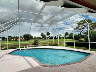 Positioned on 1 acre with sweeping golf course vistas, this on  in Florida - for sale on GolfHomes.com, golf home, golf lot