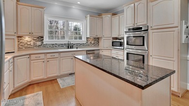 Beautiful brick Colonial home defined by classic symmetry on Ironwood Golf and Country Club in North Carolina - for sale on GolfHomes.com, golf home, golf lot