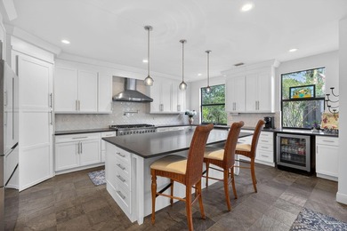 Welcome to your private South Florida retreat in the highly on  in Florida - for sale on GolfHomes.com, golf home, golf lot