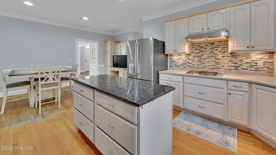 Beautiful brick Colonial home defined by classic symmetry on Ironwood Golf and Country Club in North Carolina - for sale on GolfHomes.com, golf home, golf lot