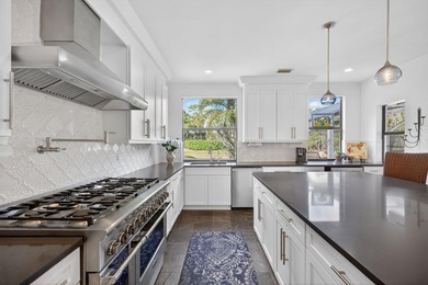 Welcome to your private South Florida retreat in the highly on  in Florida - for sale on GolfHomes.com, golf home, golf lot