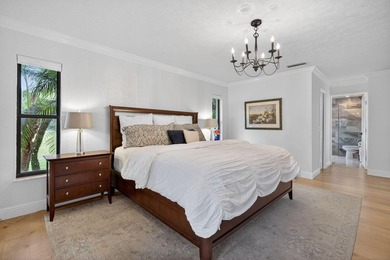 Welcome to your private South Florida retreat in the highly on  in Florida - for sale on GolfHomes.com, golf home, golf lot