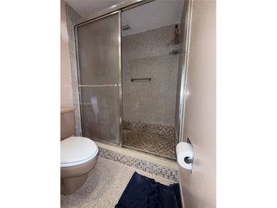 Welcome to this spacious 2 bed, 2 bath condo at 3250 N Palm Aire on Palm-Aire Country Club and Resort - The Oaks in Florida - for sale on GolfHomes.com, golf home, golf lot