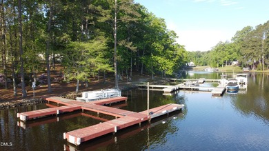 Welcome to your own slice of heaven! Nestled in the heart of on River Golf and Country Club at Lake Royale in North Carolina - for sale on GolfHomes.com, golf home, golf lot