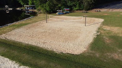 Welcome to your own slice of heaven! Nestled in the heart of on River Golf and Country Club at Lake Royale in North Carolina - for sale on GolfHomes.com, golf home, golf lot