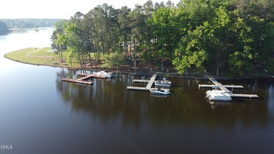 Welcome to your own slice of heaven! Nestled in the heart of on River Golf and Country Club at Lake Royale in North Carolina - for sale on GolfHomes.com, golf home, golf lot