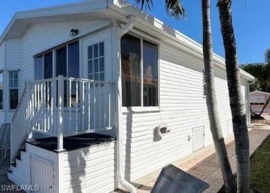 Open floor plan, high ceilings, a true 2Br/2Ba, and new roof in on The Rookery At Marco in Florida - for sale on GolfHomes.com, golf home, golf lot