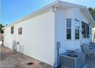 Open floor plan, high ceilings, a true 2Br/2Ba, and new roof in on The Rookery At Marco in Florida - for sale on GolfHomes.com, golf home, golf lot