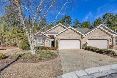 This meticulously maintained all-brick townhome, tucked away on on Cape Fear National At Brunswick Forest in North Carolina - for sale on GolfHomes.com, golf home, golf lot