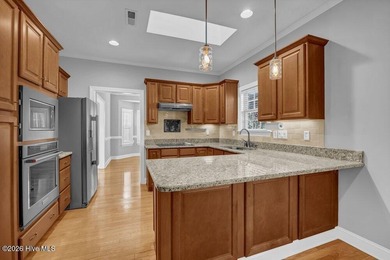 This meticulously maintained all-brick townhome, tucked away on on Cape Fear National At Brunswick Forest in North Carolina - for sale on GolfHomes.com, golf home, golf lot