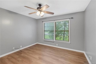 FRESH NEW LOOK! BRAND NEW VINYL PLANK FLOORING THROUGHOUT AND A on Frasch Park Golf Course in Louisiana - for sale on GolfHomes.com, golf home, golf lot