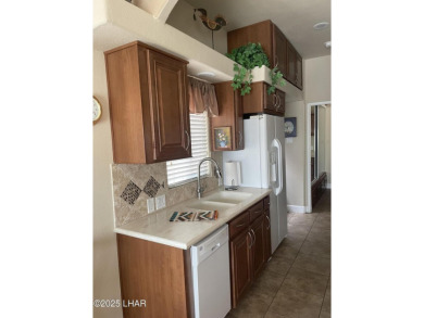Beautiful & easy to care for stuccoed Park Model w/tile roof in on The Refuge Golf and Country Club in Arizona - for sale on GolfHomes.com, golf home, golf lot